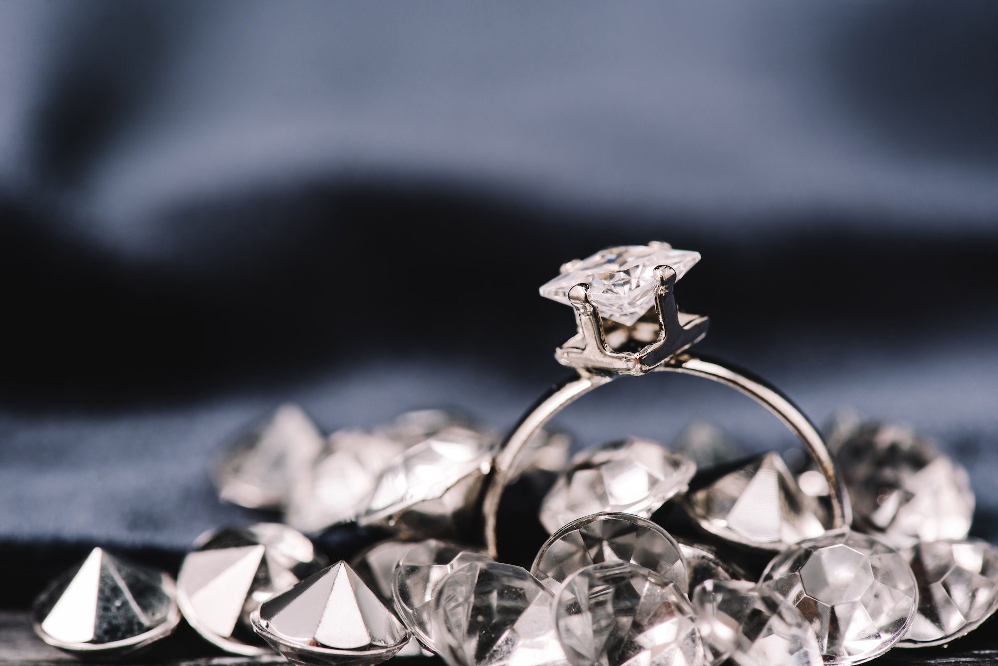 selective focus of engagement ring with pure shiny diamond